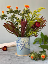 Load image into Gallery viewer, Blue vase with flowers pattern and floral arrangement