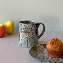 Load image into Gallery viewer, Black and Blue Mug with Abstract Flower