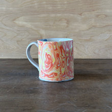Load image into Gallery viewer, Orange and yellow marbled patterned mug