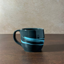 Load image into Gallery viewer, Black Mug with Blue Swirl
