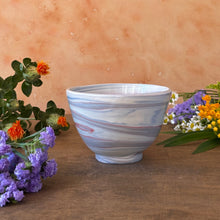 Load image into Gallery viewer, Porcelain bowl with marbled design on a wooden surface with flowers
