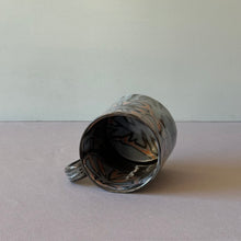 Load image into Gallery viewer, Black and Blue Mug with Abstract Flower
