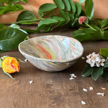 Load image into Gallery viewer, Marbled ceramic bowl on a wooden surface with flowers and leaves
